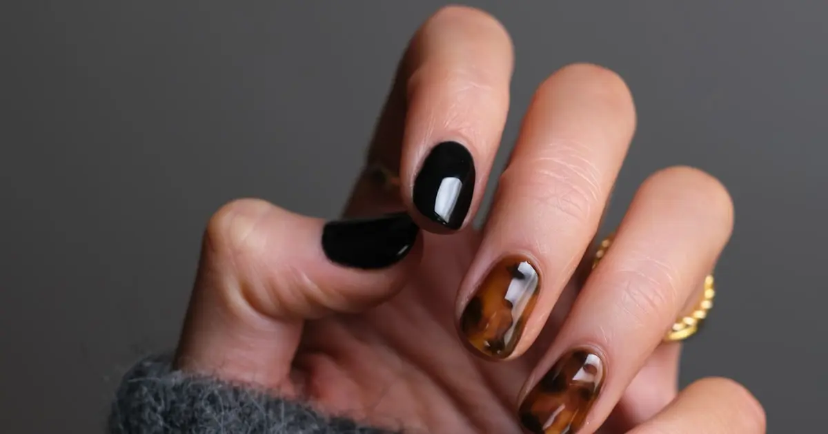 Array of HEMA-free gel nail polish bottles in a professional salon setting